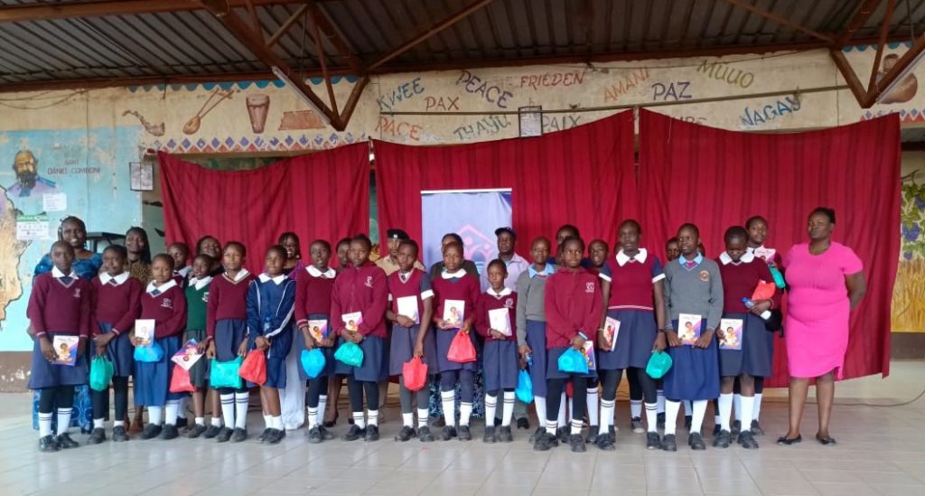 Primary School girls receive Dignity Self care Kits from Girl Puberty Intiative